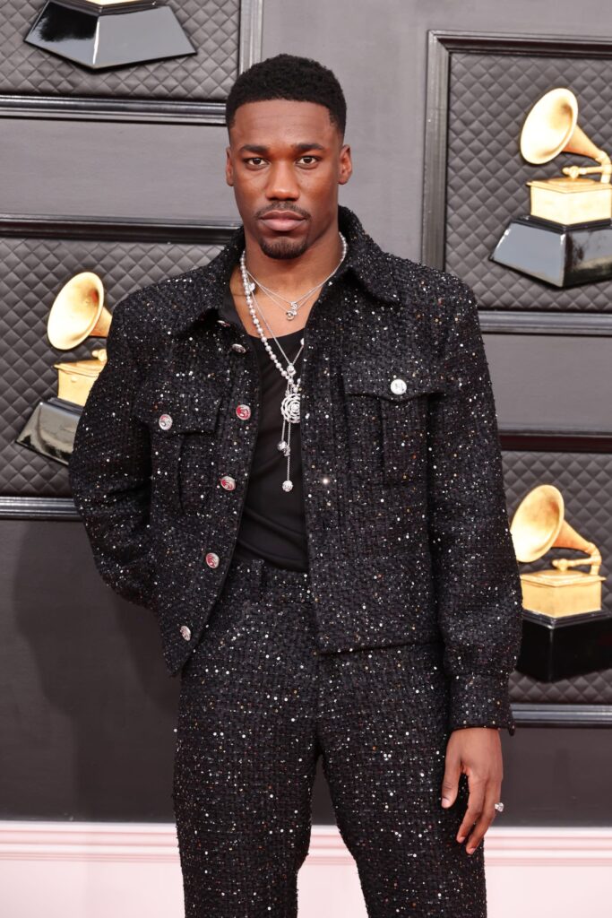 Giveon Gives Chanel Menswear Treatment in Tweed Suit at Grammy Awards –  Footwear News
